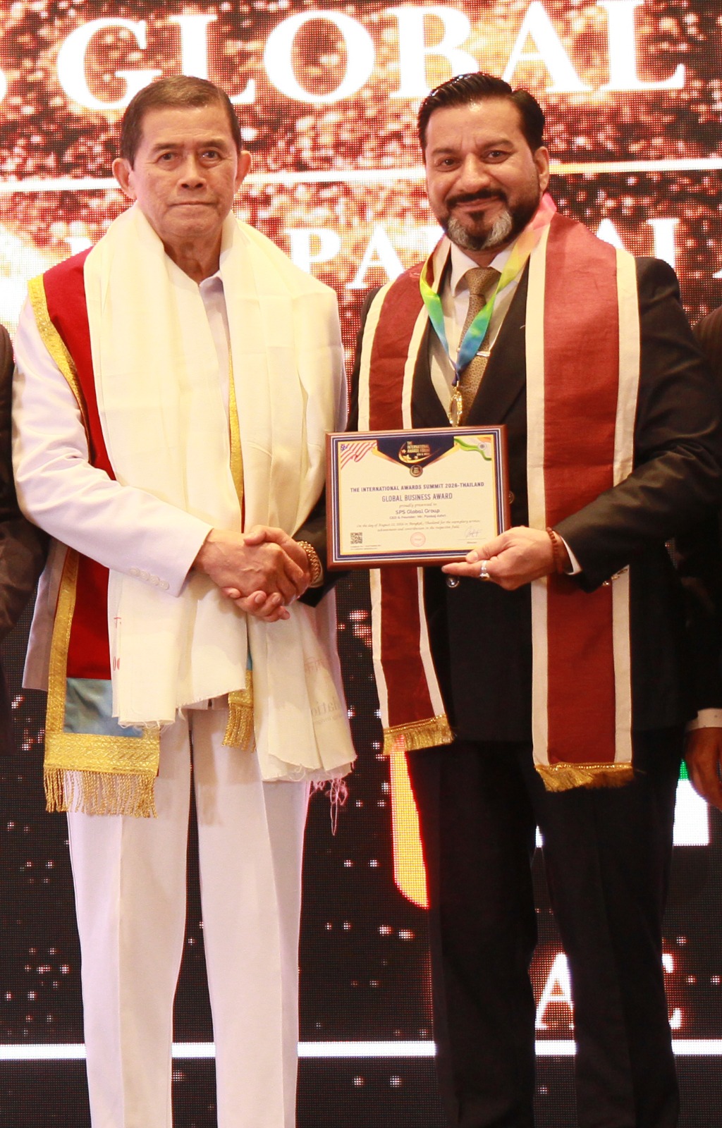 Mr. Pankaj Ashri receiving The International Awards Summit 2026 - Thailand with Mr. Korn Dabbaransi